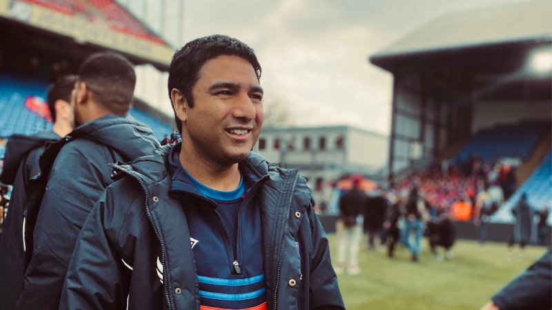 Nate on a soccer field smiling