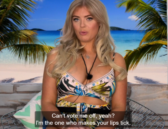 woman in front of tropical background saying "can't vote me off, yeah? I'm the one who makes your lips tick"